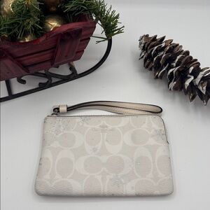White snowflake coach wristlet winter Christmas snow signature wallet pouch